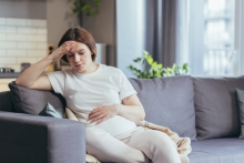 pregnant woman feels unwell