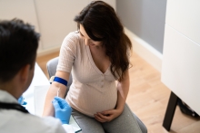 pregnant woman receives blood draw