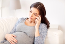 pregnant woman on phone call