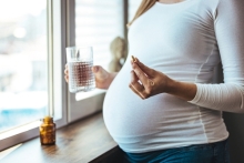 pregnant woman with supplements