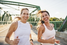 Two women running together for exercise