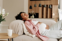 A pregnant woman lying down